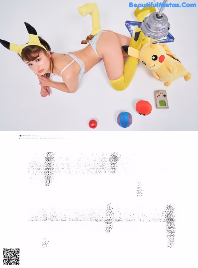 A woman in a bikini laying on the ground next to a stuffed animal.
